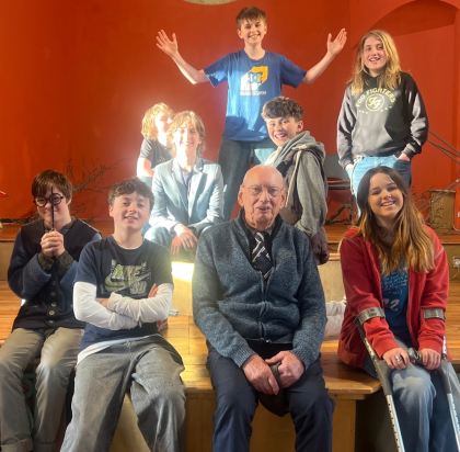 Rehearsals for UNWIPED: Playground Arts Young People's Theatre members with John Osmond (86), whose lived experiences inspired the immersive production bringing generations together at this year's Totnes Fringe Festival.