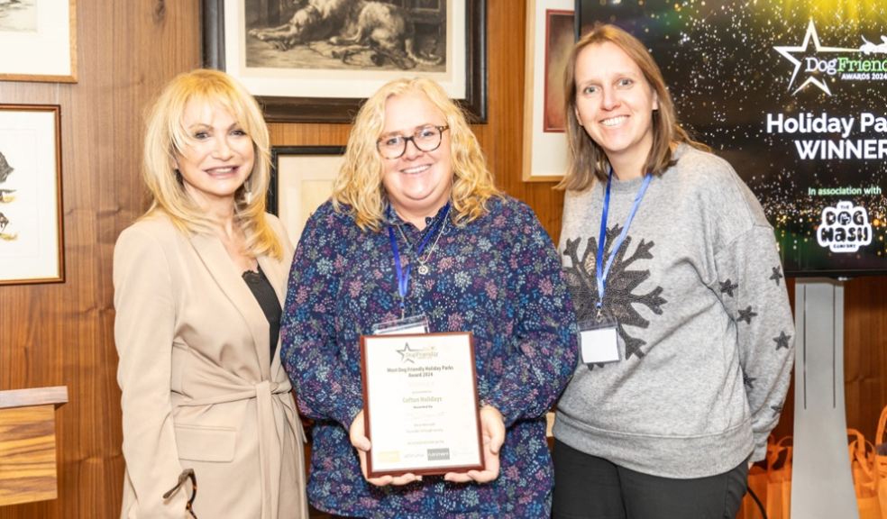 L-R: Actress Debbie Arnold presenting the DogFriendly Holiday Park of the Year award to Cofton Holidays directors Helen Scott and Mellony Kirby