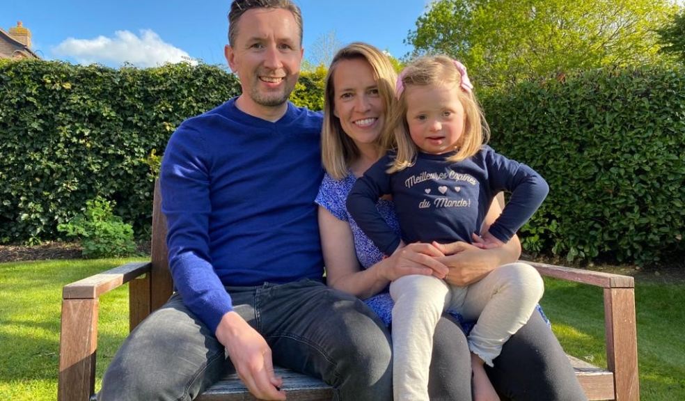 Family sitting on bench