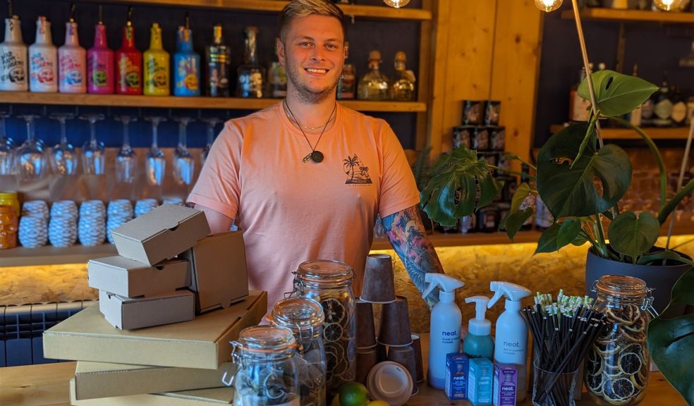 Owner of Aquarius Bar with some of the eco friendly products used