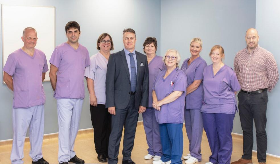 Mark White, centre, with heads of departments at Practice Plus Group Hospital Plymouth