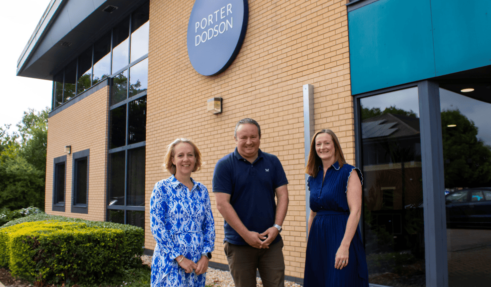 L to R is Kate James, Managing Partner, Ben Hingley, Parter and Head of Commercial Property, and Eveyln Adfield Partner and Head of Corporate Commercial. Three people stood outside a Porter Dodson office