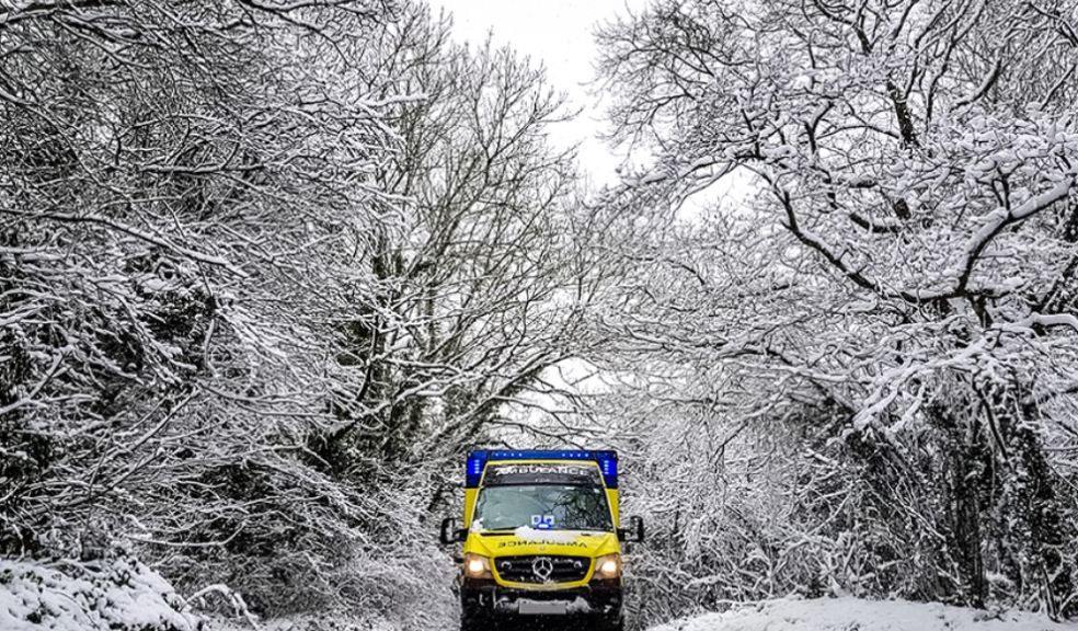 A SWASFT ambulance responding to a call in the snow. 
