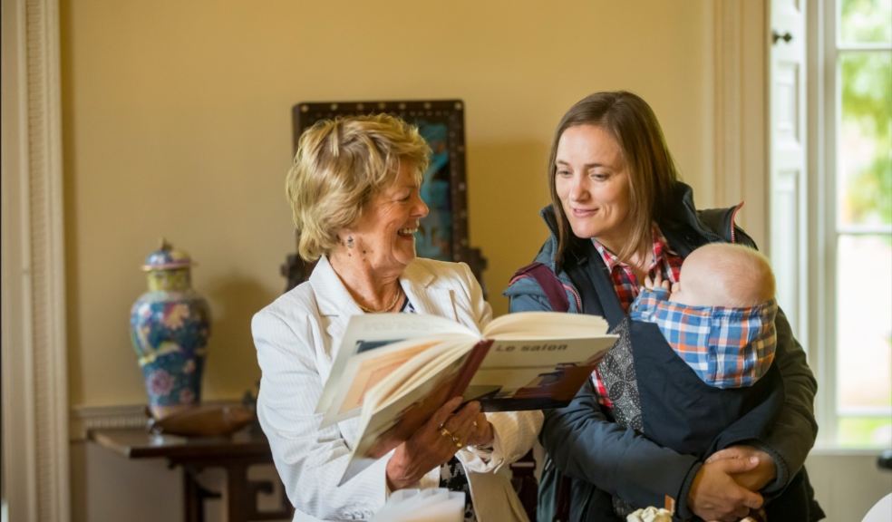 A volunteer room guide with a visitor at Greenway Credit National Trust Images Chris Lacey 2023.