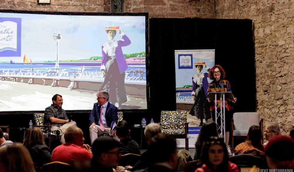Agatha Christie giving presentation to people