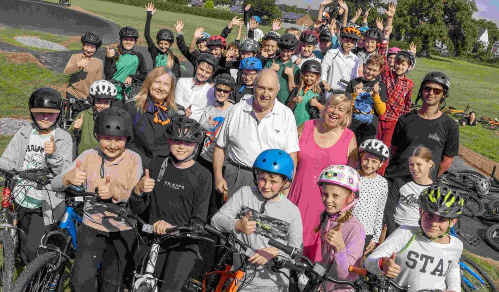Anne Hawkins, Barry Warren and Jill Moores with local youngsters and Kye Forte at the opening ceremony of the new pump track in Willand.