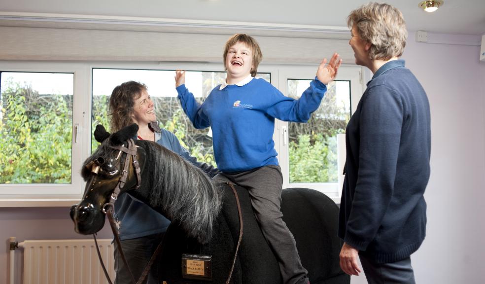 WESC Student Bethany (centre) on ‘Black Beauty’ with therapists Kayan Gardner (left) and Nicky Groucutt (right)