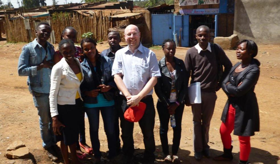 Dr Bob Newbery with young trainees in Kiambu County.