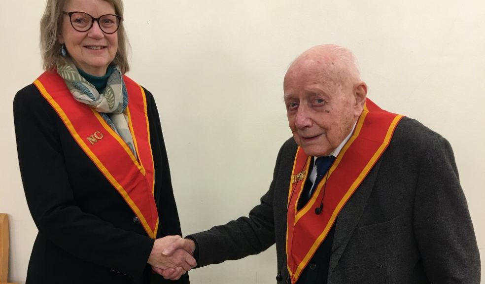 Bro. Michael O'Leary hands over to Sis. Brenda Lowe