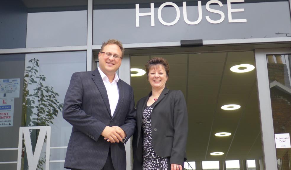 Mike Pinney Contracting Director and Caroline Hill, Head of Sales & Marketing of C G Fry & Son outside new Taunton office