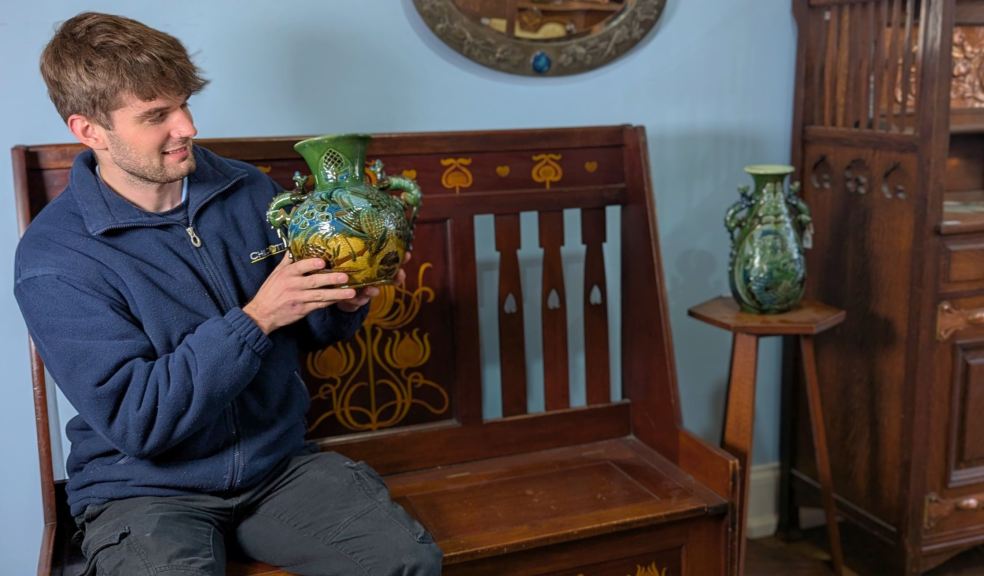 Cataloguer Barnaby Willis with examples of Brannam Pottery and Shapland and Petter furniture