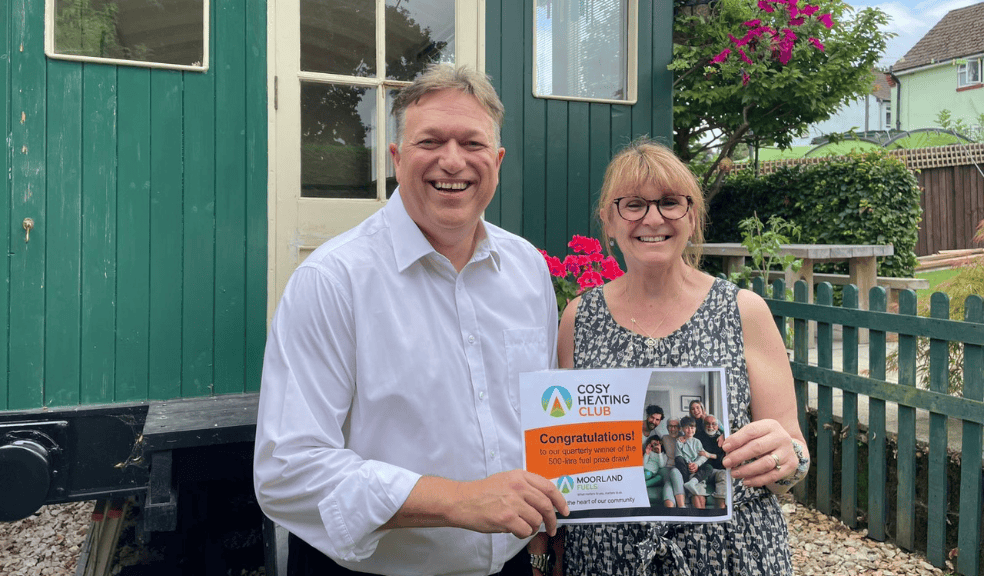 Moorland Fuels' Cosy Heating Club Winner, Caroline Munn and David Cook, Commercial Sales Account Manager at Moorland Fuels. Moorland Fuels' Cosy Heating Club Winner and Commercial Sales Account Manager