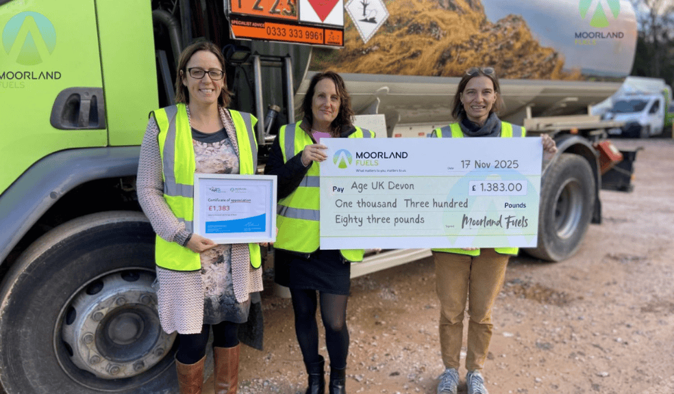 Age UK Devon l-r Abby Turner, Director (Moorland Fuels), Sophie Littlewood (Age UK) and Andrea Williams (Moorland Fuels) 3 women holding up big cheque for Age UK Devon