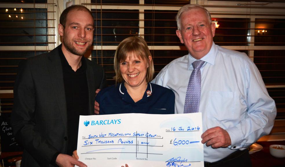 Dean Cruickshanks presenting cheque on behalf of iPlymouth and Wolfertans to Sarah Earl and Wally Wright