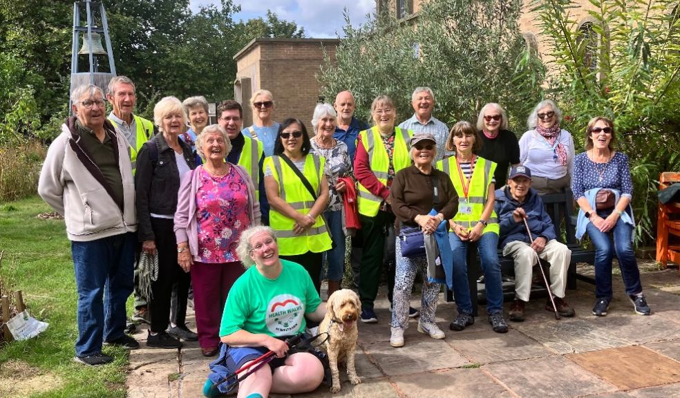 Debbie Hutchinson, her dog Aroha and their walking companions at St Sidwell's in Exeter (photo by Sharon Goble)