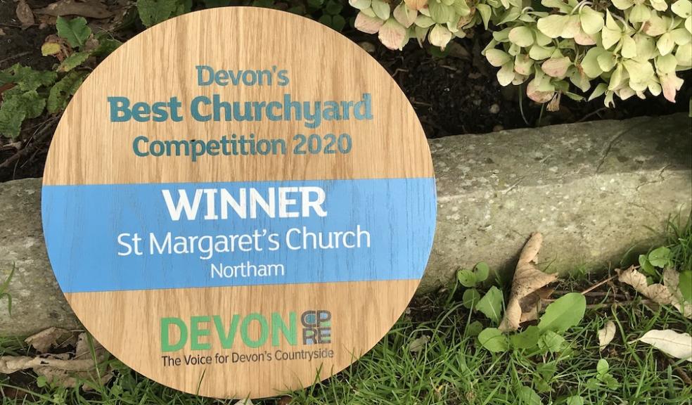 Devon's Best Churchyard 2020 winner's plaque in the churchyard at Northam