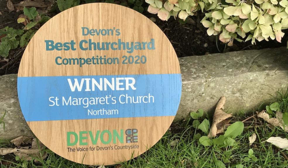 Plaque for last year's winner of Devon's Best Churchyard