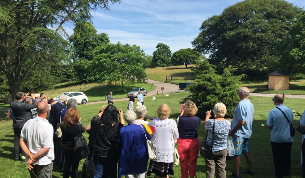 Dove release by memorial tree at Saltram