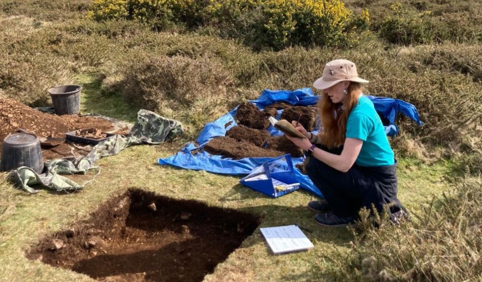 woman digging in dartmoor archaeological dig