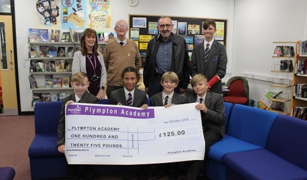 From left to right, Plympton Academy librarian, Julie McGlinchey with Mr Rean and Mr Meatyard of the Freemasons Lodge of Fidelity, with students, Joshua Tucker, Oliver Wroe, Chioma Duru, Theo Clancy and Armandas Nekrasius.