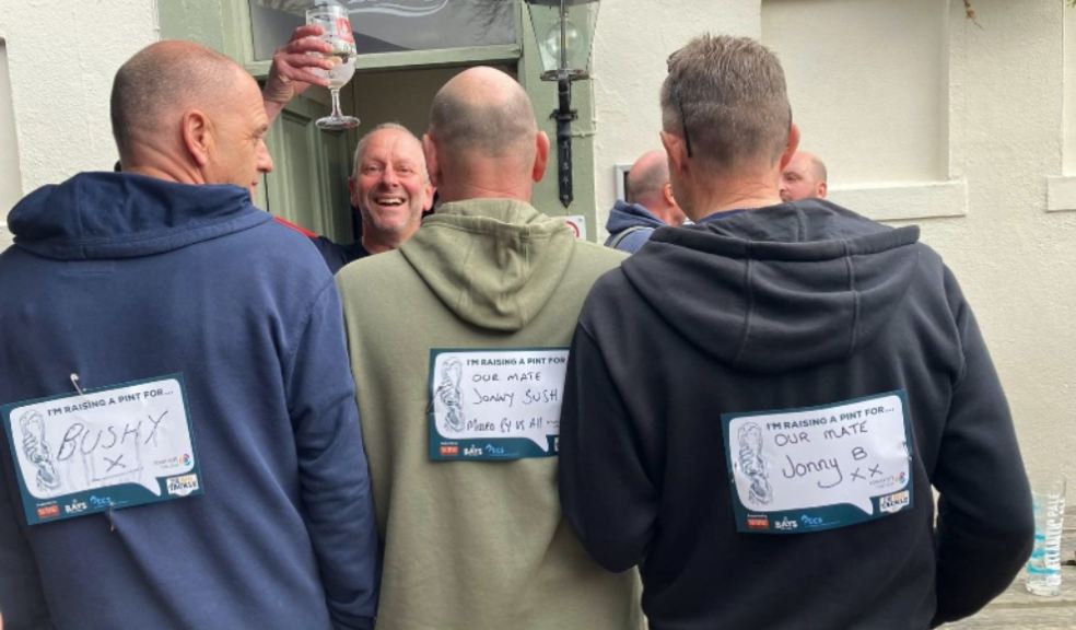 Gary Adderley raises a glass to his late-friend John Bush at The Big Tackle 2023; photo from The Big Tackle, March 2023.