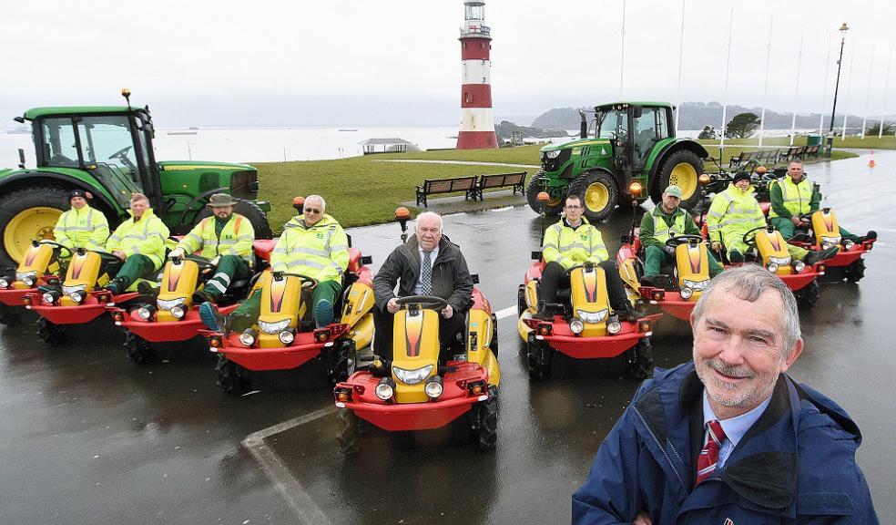 Council Leader Ian Bowyer (foreground), joins Councillor Mike Leaves on Plymouth Hoe to inspect the new grass cutting equipment. Photo: Plymouth City Council