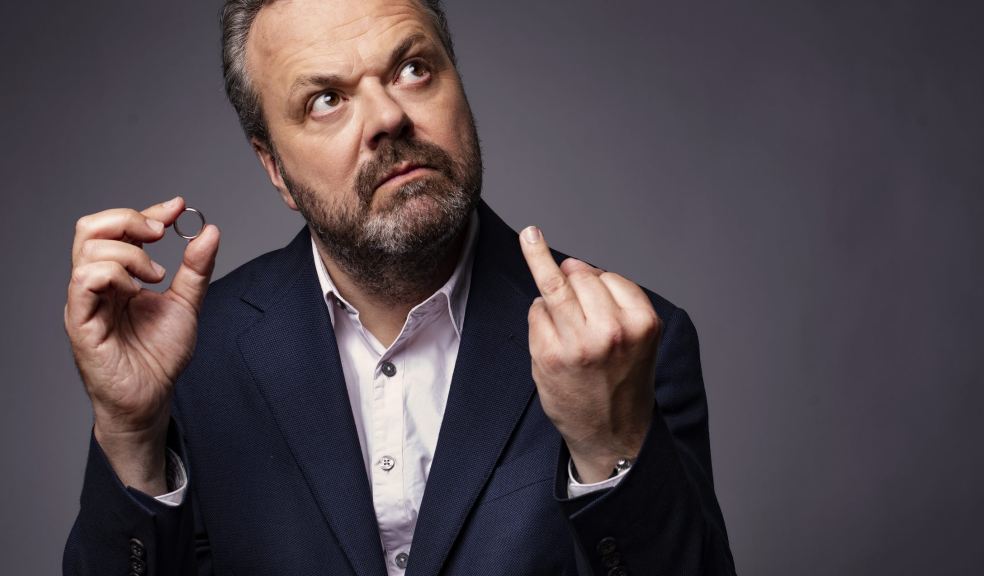 Hal Cruttenden A photo of Hal Cruttenden wearing a blue suit and holding his wedding ring