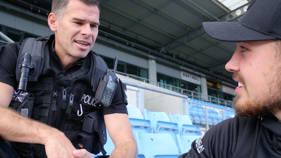 Jack Nowell speaking to traffic officer Sergeant Harry Tangye
