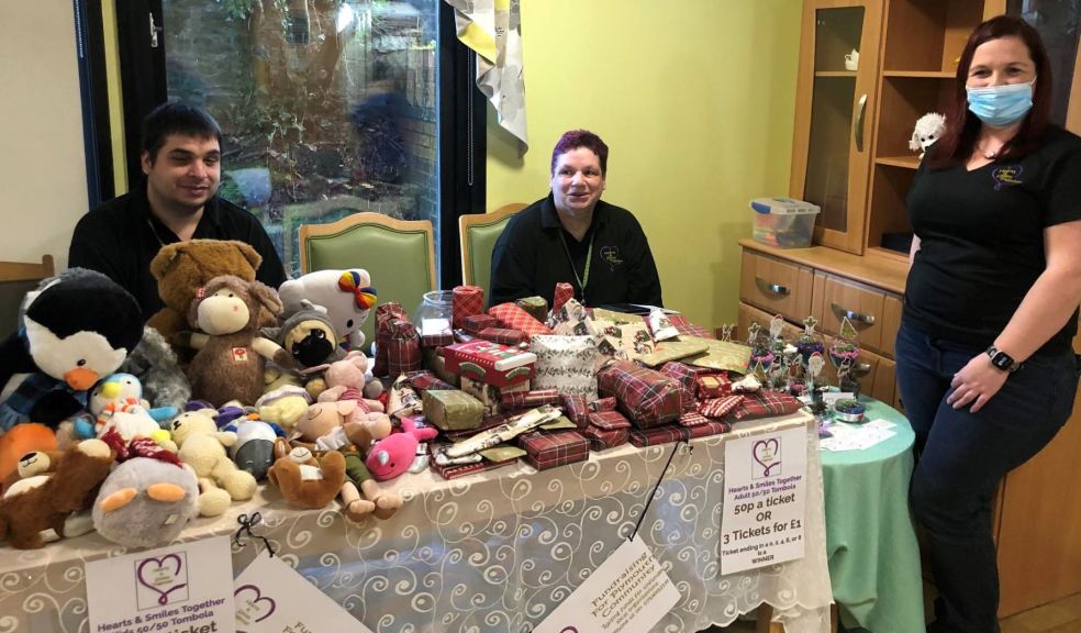 Hearts and Smiles Together pop-up table at Butterfly Lodge Christmas Fair with L-R Leigh Williamson, Maggi Williamson and Colette Thompson pop-up table at Butterfly Lodge Christmas Fair