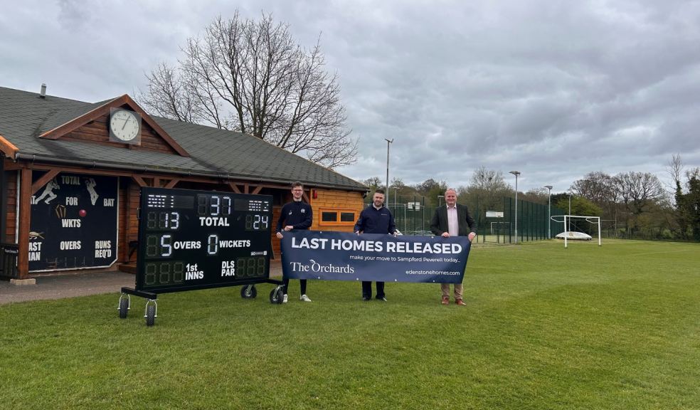 Heathcoat Cricket Club vice-chairman Chris Salter, Edenstone sales consultant Darren Kellaway, and Heathcoat Cricket Club chairman Dean Edwards, by the side of the new digital scoreboard and pavilion