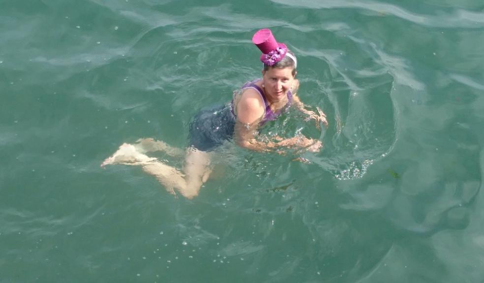 Heather Turner swimming with hat