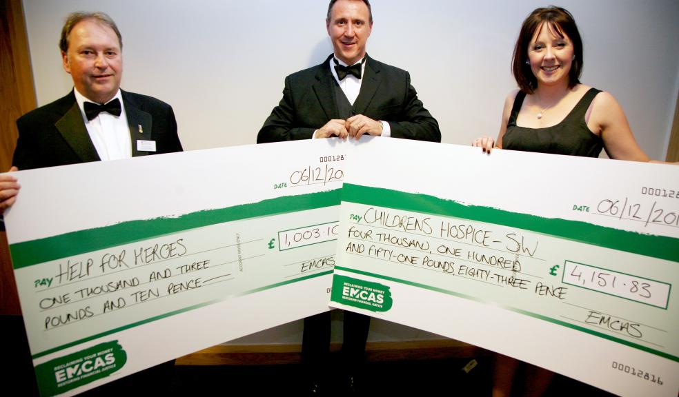 Craig Bernhardt, CEO of EMCAS, handing over cheques raised by its staff to Naomi Dymond of South West Children’s Hospice (£4,151), and to Rob McGovern of Help for Heroes (£1,003). A cheque for £1,182 was also presented to Grief Encounter. ‘Photos: © AVA Images Photography’.