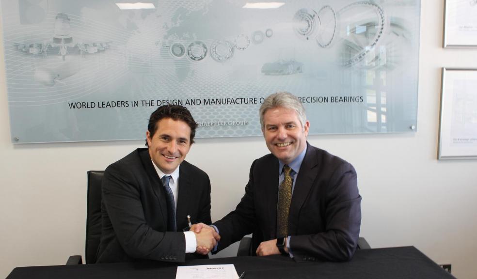 Johnny Mercer MP for Plymouth Moor View (left) and Jon Everett Managing Director at Barden UK (right) sign The Armed Forces Covenant at the Barden UK plant in Estover, Plymouth.