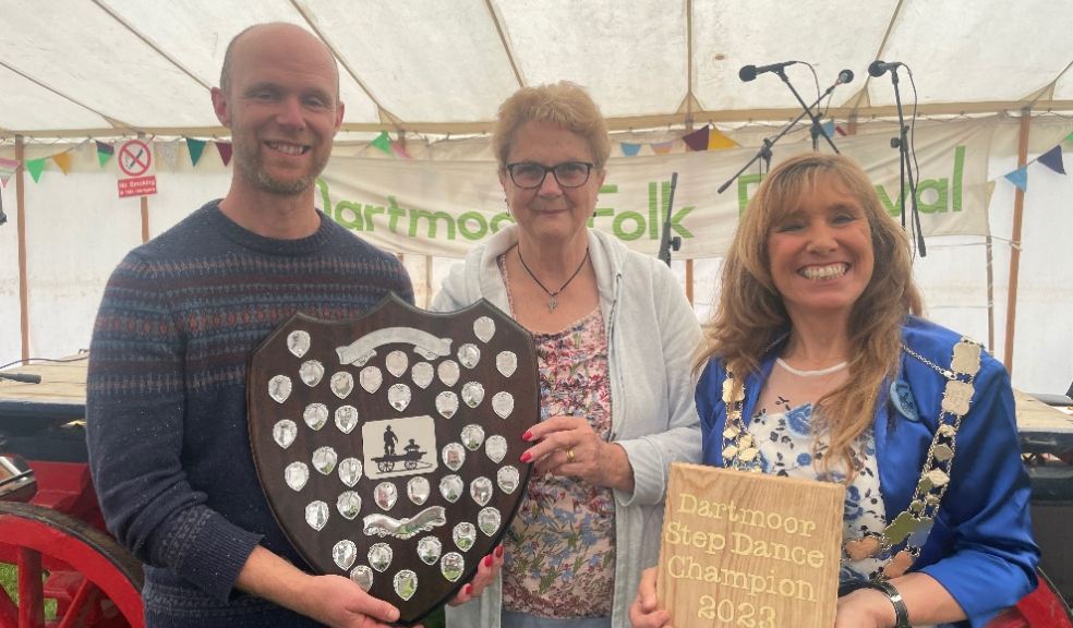 Matt Norman receiving the Dartmoor Step Dance Champion awards from president Shirley Bazeley, centre, and the Mayor of West Devon, right.
