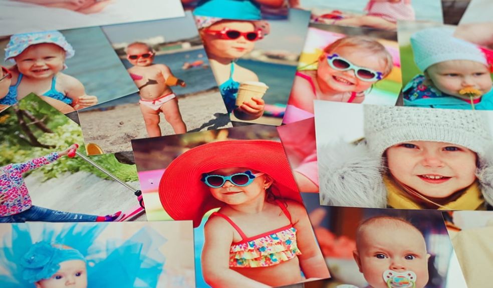 Several photo prints of babies are displayed Several photo prints of babies are displayed