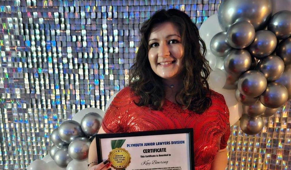 Kay Bowring collecting her award