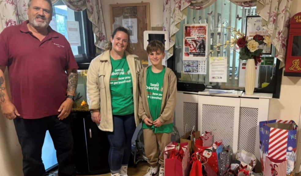 L-R Butterfly Lodges activities co-ordinator Paul Hutt taking delivery of Christmas presents from Dunelm volunteers