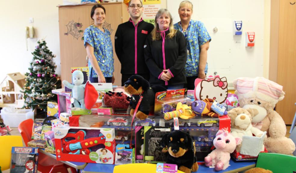 Shane Keeler and Helen Carter from Mecca Bingo with Play Specialists Helen Waring and Jo Cross
