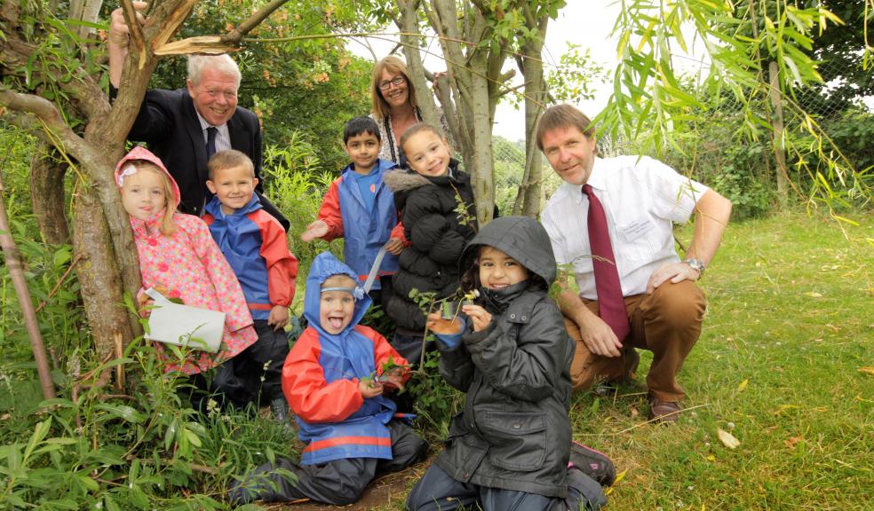 Natural England Chair Poul Christensen, Plymouth Uni Project Lead Sue Waite and Bill Graham from FACE - hosts of the Growing Schools web service - with children from Glenfrome Primary School