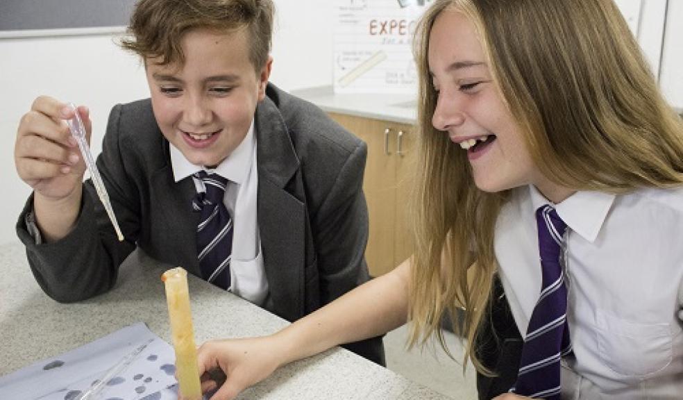 Photo caption: Year 7 Oliver Wilson and Lexi Palmer taking part in the chemistry experiment.