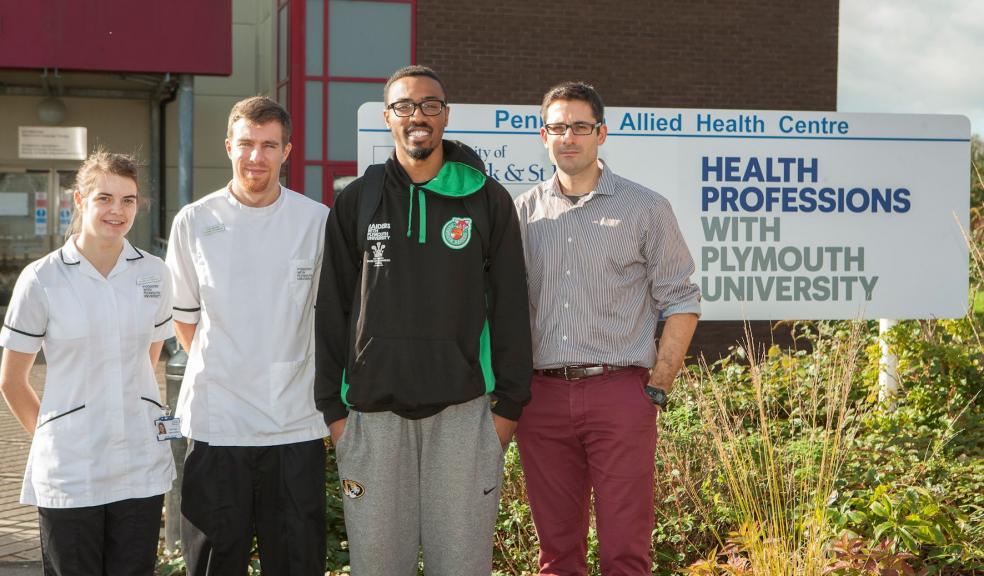 Matt Pressey with Vasileios Lepesis, Lecturer at Plymouth University School of Health Professions, and Podiatry students Jack Walker and Erica Knapp outside Plymouth University’s Peninsula Allied Health Centre