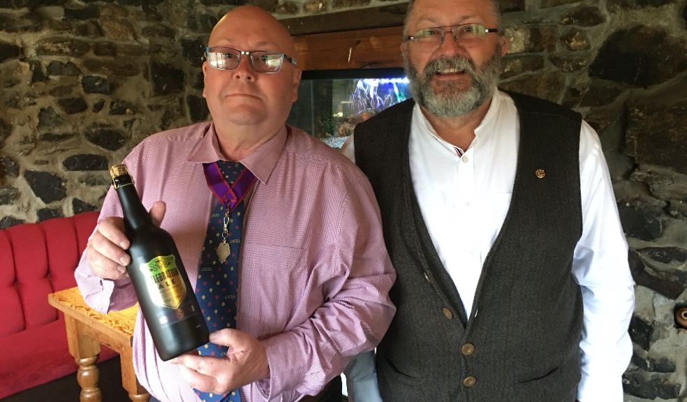 Bro. Bill Cook with one of the craft beers and Bro. Peter English
