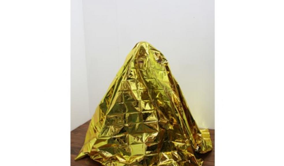 Paul Vivian, Crouching Billionaire Ghost, 2014. Safety blanket, wood, metal, tape, cut paper. Height approx. 100cm.