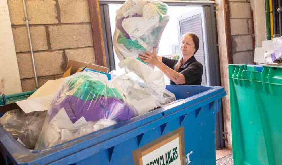 Miranda Cole, Hospitality Services Supervisor at Peninsula NHS Treatment Centre, deals with sorted recyclables at the hospital which has joined Plymouth’s Plan for Plastics.