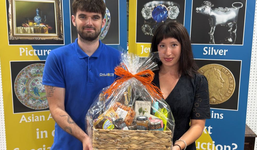 Barnaby Willis and Amelia Draper with the prize hamper Barnaby Willis and Amelia Draper with Chilcotts prize hamper which can be won at the Honiton Show