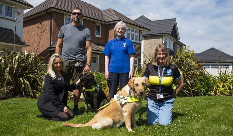 Redrow sales consultant Louise Azimi with the Okehampton & District Guide Dogs Fundraising group (Ri