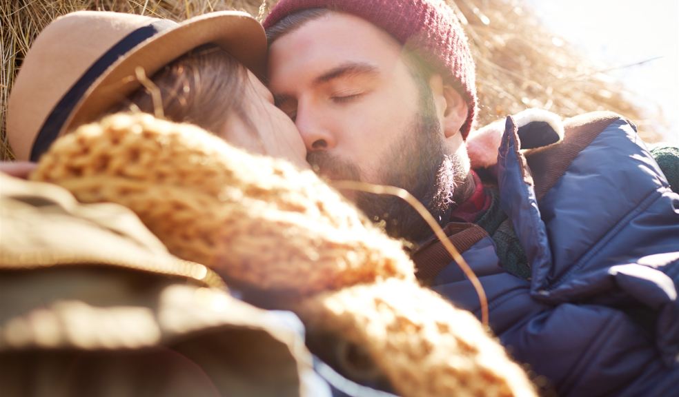 Farming couple kissing