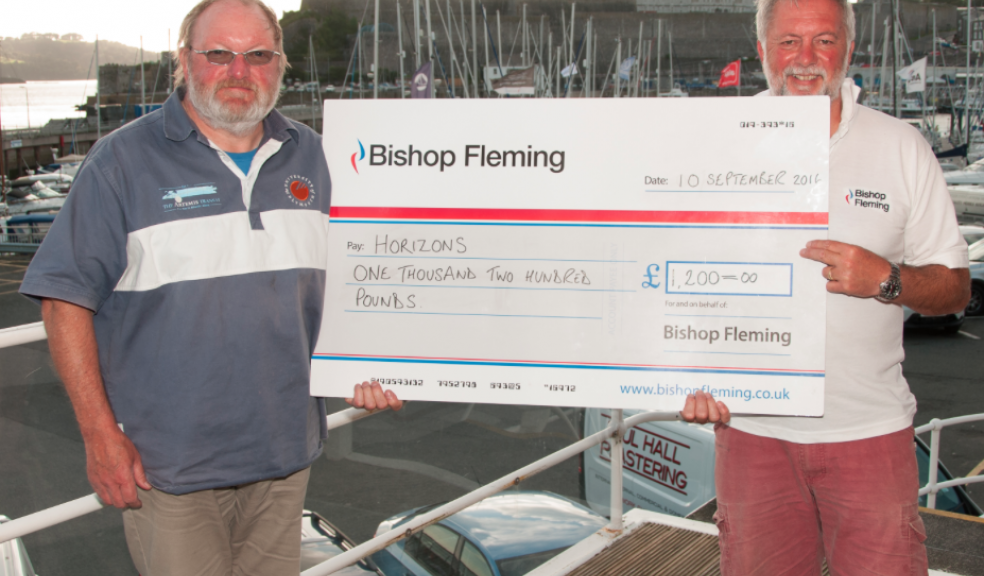 Charlie Thomson, Partner, Bishop Fleming presents the cheque to Dr Andrew Eccleston, Treasurer of Horizons.