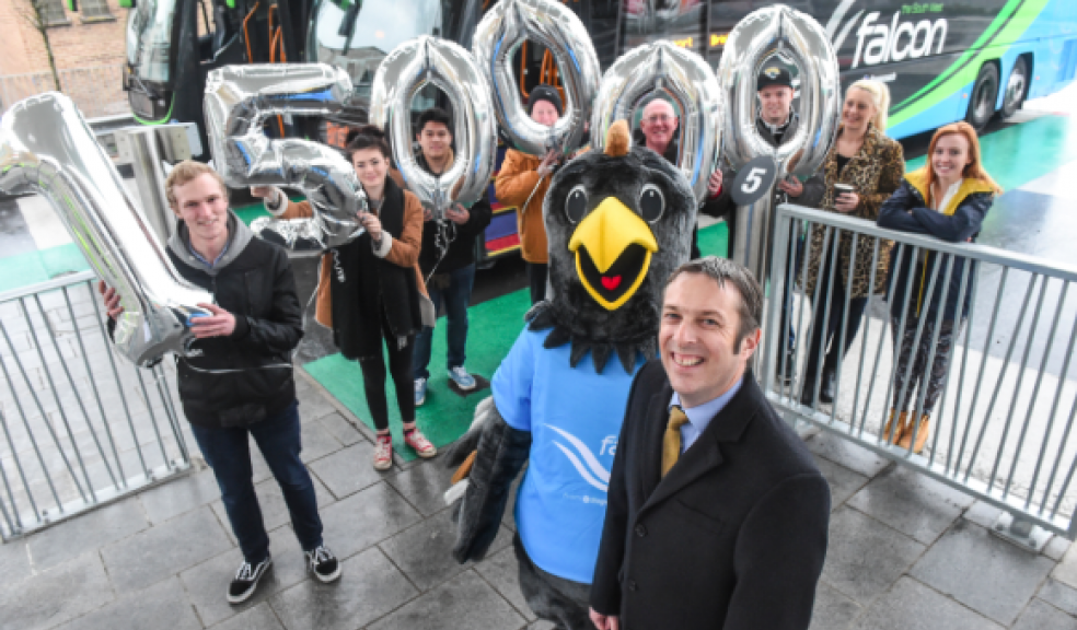 Bob Dennison, Managing Director of Stagecoach South West, with Falcon customers and mascot Pat the Falcon.