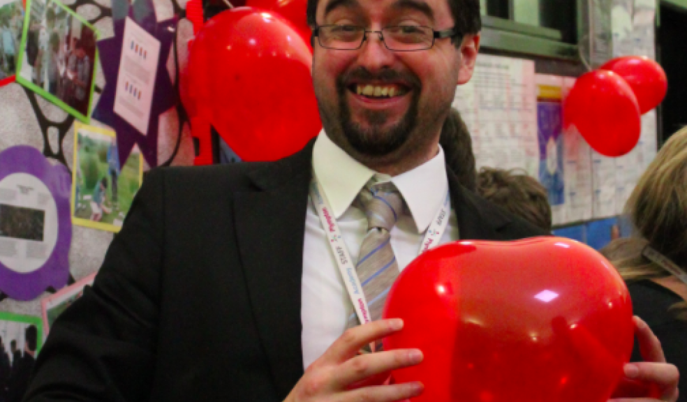 Jim Strachan at Valentine themed cake sale